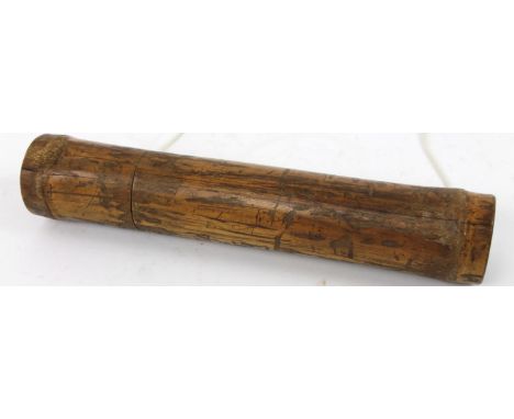 An African tribal Zulu type wooden arrow quill, with cylindrical lift off top and modern stringing, 37cm high.