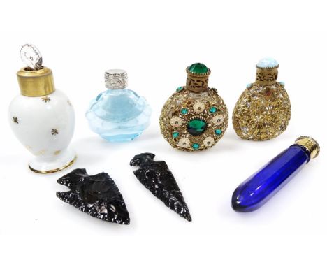 An early 20thC Bristol Blue style glass perfume bottle, of shaped outline with cylindrical lid, 8cm high, a blue glass and ba