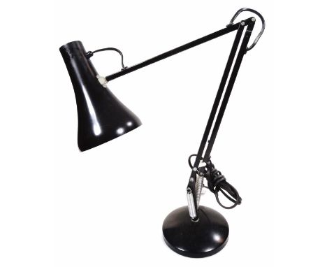 A mid 20thC Bauhaus design angle poise lamp, with shaped shade, articulated stem and circular foot, the base 16cm dia.