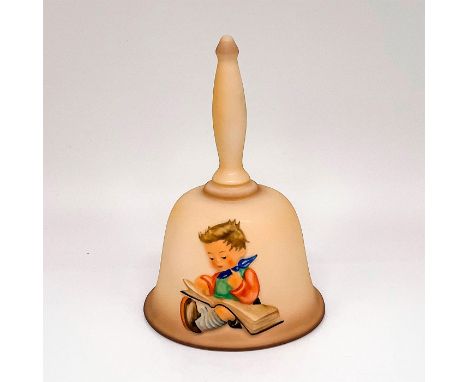 Matte porcelain tan bell HUM702. Semi-high relief of a child reading a book, and text 1980 M.I. Hummel on the other side, Goe