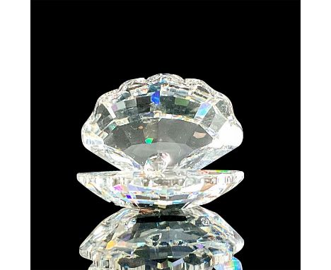 Part of the "Aquatic Worlds" group themed series, model 7624. Features a faceted clear crystal open clam shell with a diamond