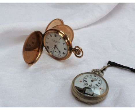 A 9ct yellow gold hunter pocket watch, the enamel dial with Roman numerals and a seconds subsidiary dial inscribed "Thos Russ