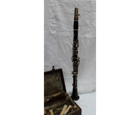 A Boosey and Hawkes Emperor Clarinet, No.294616 in a faux crocodile skin hard case