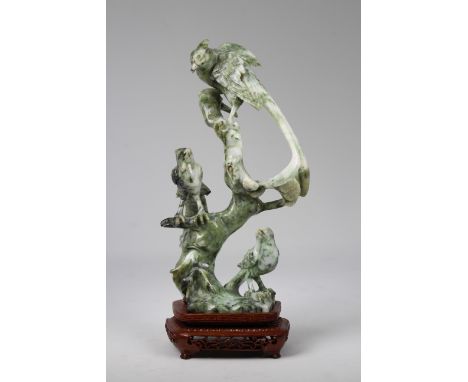 Chinese Hunan Province Jade Carved Phoenix on Stand. Depicting three phoenixes on a tree branch. Housed on a carved/reticulat