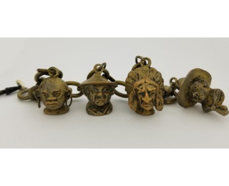 Antique Multiethnic Metal Charm Bracelet Featuring African, Chinese, Native American and Western Cowboy Portrait Charms. Leng