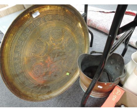An Anglo Indian style brass tray and copper coal helmet