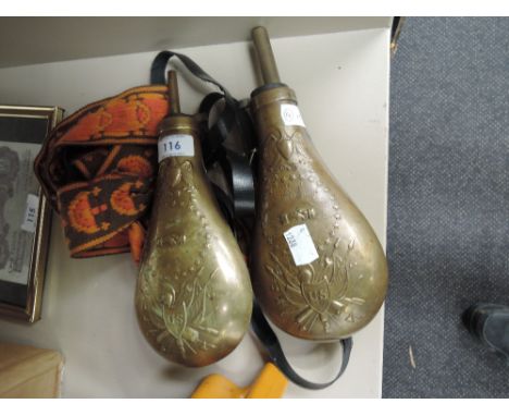Two copper powder flasks with US coat of arms