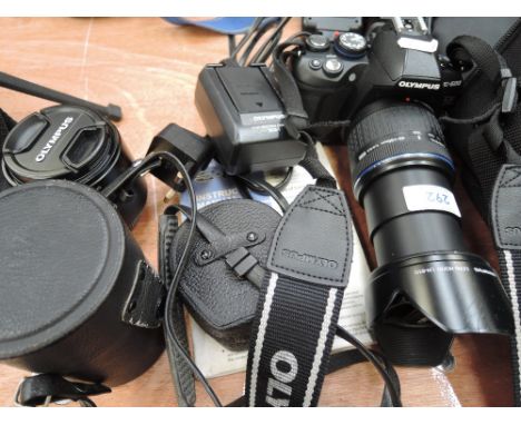 An Olympus E-600 digital camera with bag and selection of Olympus lenses