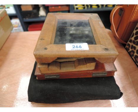 Three mahogany photographic plate holders, and two contact print frames