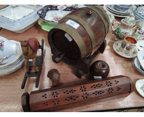 A selection of treen including oak barrel decanter, miniature rocking horse etc