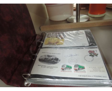 An album of first day covers , 11 with autographs