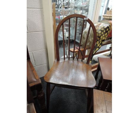 A traditional hoop and stick back kitchen chair, a vintage oak record trolley, and a modern oak nest of tables