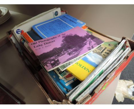 A selection of Ordnance Survey maps, guidebooks etc