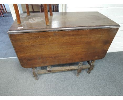 A mid 20th Century oak twist gate leg table