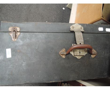 A metal travel trunk , keys marked made in Bombay