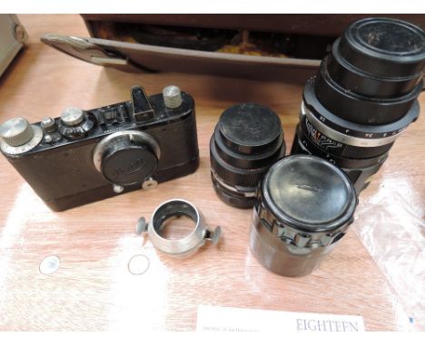 A 1936 Ernst Leitz Wetzlam Leica I or Standard camera No210680, in leather case, with two Soligar lenses