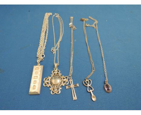 Five HM silver and white metal pendants including Welsh love spoon, Silver Jubilee ingot, Shetland Silvercraft, cross & ameth