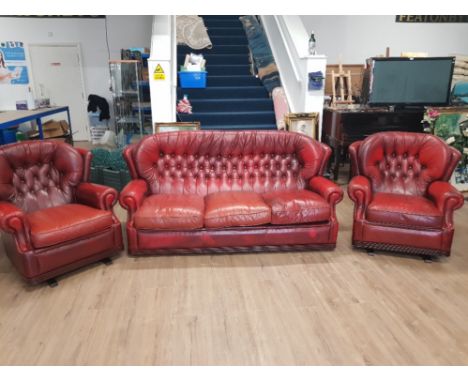 OXBLOOD RED 3 PIECE SUITE INCLUDES 2 WING BACK ROCKERS AND 3 SEATER SOFA IN THE CHESTERFIELD STYLE