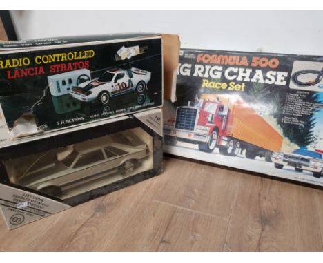 2 RC CARS LANCIA STRATOS AND 2800 MUSTANG PLUS VINTAGE FORMULA 500 BIG RIG CHASE SET