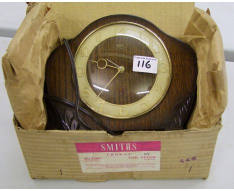A Smiths 'Croway' Oak cased electric mantle clock, with original box (untested).