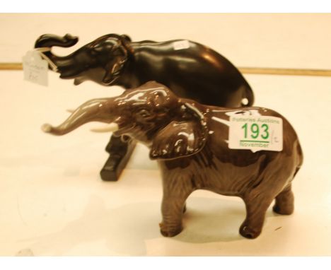 Beswick elephant 974 together with similar Minton item. (2).