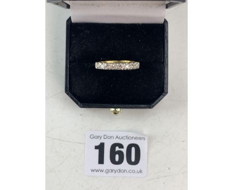 18k gold and diamond eternity ring, size K, w: 3 gms