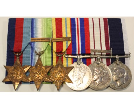 Group court mounted as worn - 1939-45 Star, Atlantic Star + France & Germany clasp, Africa Star + North Africa 1942-43 clasp,