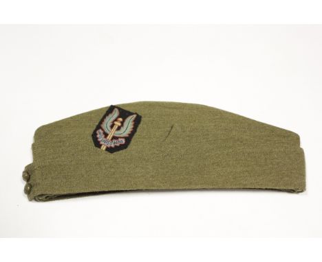 British Army soldiers sidecap, dated 1941 by Fox Bros, evidently unused with a larger sized early type cloth SAS badge