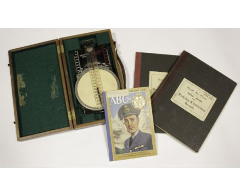 RAF Navigators course and speed computer in wood case with RAF note books, protractor and flying helmet etc   