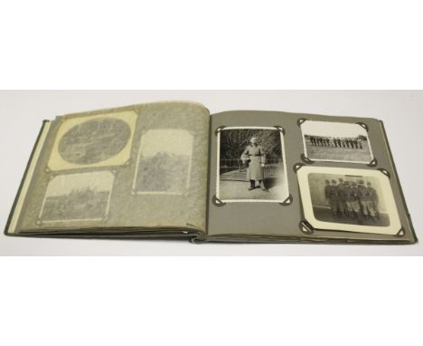 German WW2 photo album with front cover with eagle Stab II. A.R . 4 dated 1936 containing mainly army photos with various fie