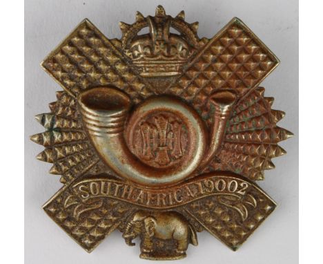 Badge - original brass Highland Light Infantry with South Africa 1900-2 Scroll 