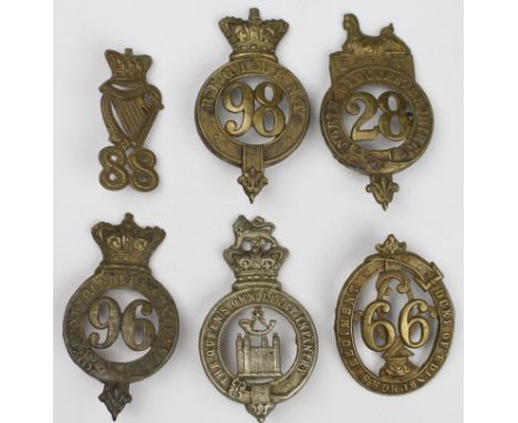 Glengarry badges inc No 98 Regiment, No 99 Duke of Edinburgh's Regt, No 88, The Queens Own Light Infantry, No 96, No 28 North
