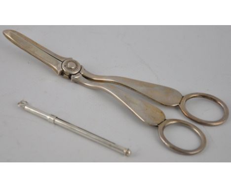 A pair of Edwardian silver grape shears, Sheffield 1902, together with a white metal propelling swizzle stick 