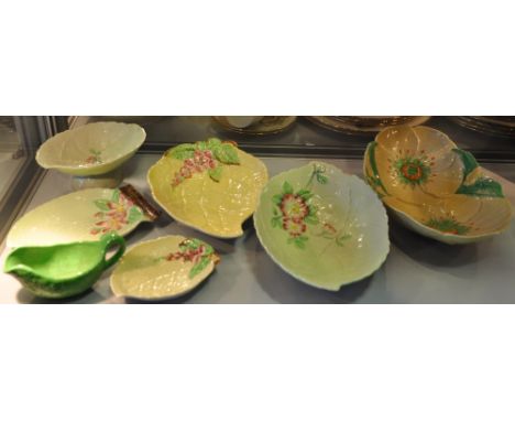 Six pieces of Carltonware Australian design leaf moulded dishes together with an earlier cabbageware sauceboat