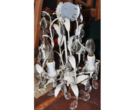 A contemporary cream metal four branch electric ceiling light, hung faceted pear shaped glass drops