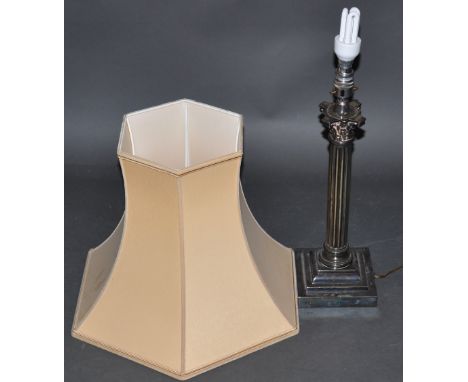 A table lamp fashioned as a corinthian column