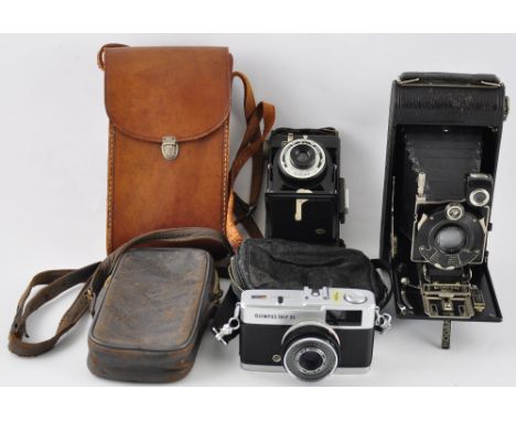 An early 20th Century Kodak Series III large format bellows camera with tan leather case, together with a similar Folding 'Br