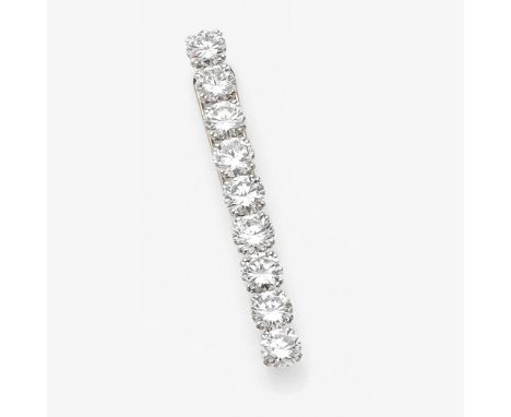 BOUCHERON - ANNEES 1960IMPORTANTE BARRETTE NEUF DIAMANTSElle est ornée d'une suite de neuf diamants taille brillant en châton