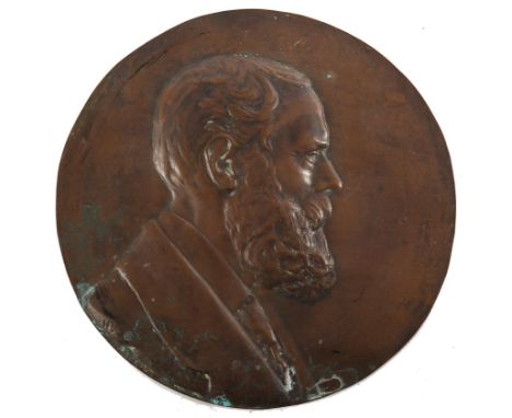 A copper relief portrait of Charles Stewart Parnell, 8" (20cm) diameter. 