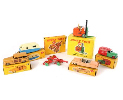 Five boxed Dinkys, 470 Austin van Shell, 190 Caravan, 344 Estate car, 323 Triple gang mower, 401 Fork lift truck Coventry Cli