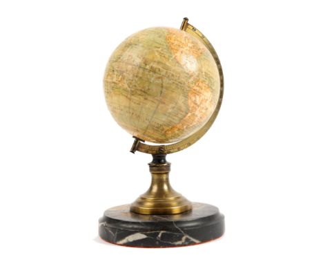 Circa 1890 A French terrestrial desk globe by E. Bertaux, Paris, the 4" globe with printed gores, the continents demarcated i