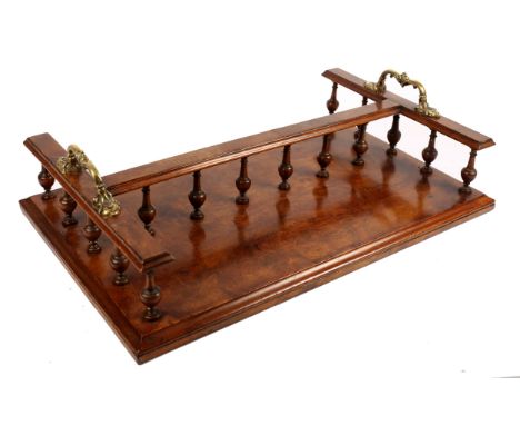 A Victorian burr walnut book trough, the superstructure with two brass carrying handles. 24" x 15" x 7" (61 x 38 x 18 cm) 