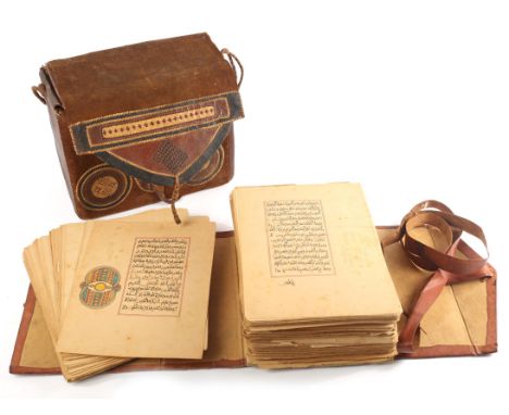West African travelling Qur?an. A loose-leaf illuminated koran, part printed part manuscript, in leather travelling case.