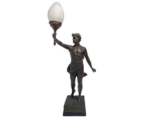 Antimony statue representing young man with a light. H cm 94.