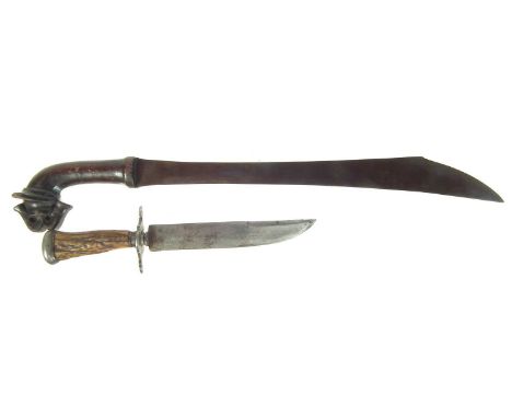 Indonesian Klewang, with carved wood grip, together with a hunting knife the blade stamped Bopot, fitted with horn grip.  The