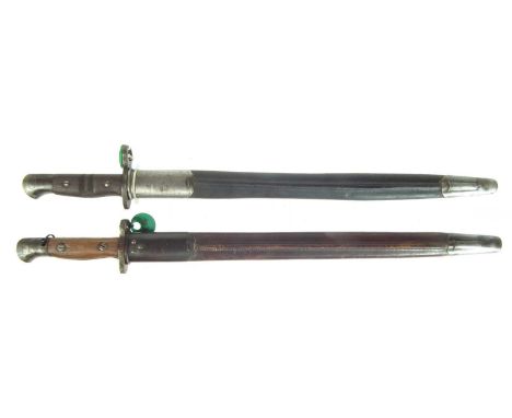 Two bayonets and scabbards, to include:Pattern 1913 made in the USA for Britain, left ricasso stamped with model number 1913 