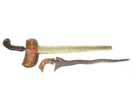 Indonesian Kris dagger, with a double-edged straight blade, leaf work decorated scabbard and shaped polished hardwood grip to