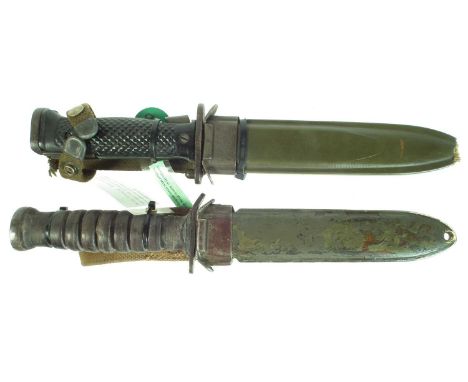 US bayonet with scabbard and fighting knife and scabbard, the fighting knife being a M3 first issued to U.S. Army soldiers in