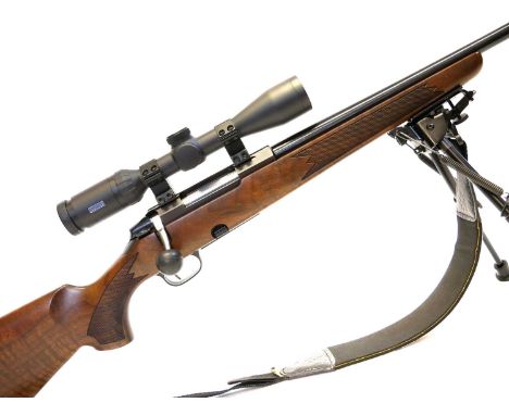 Tikka .222 M595 bolt action rifle, 22inch barrel screw cut for moderator, in figured flamed walnut stock, with rubber extende