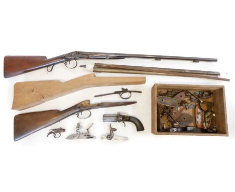 Collection of restoration project guns and spares, to include the major parts of a percussion double barrel 20 bore shotgun b